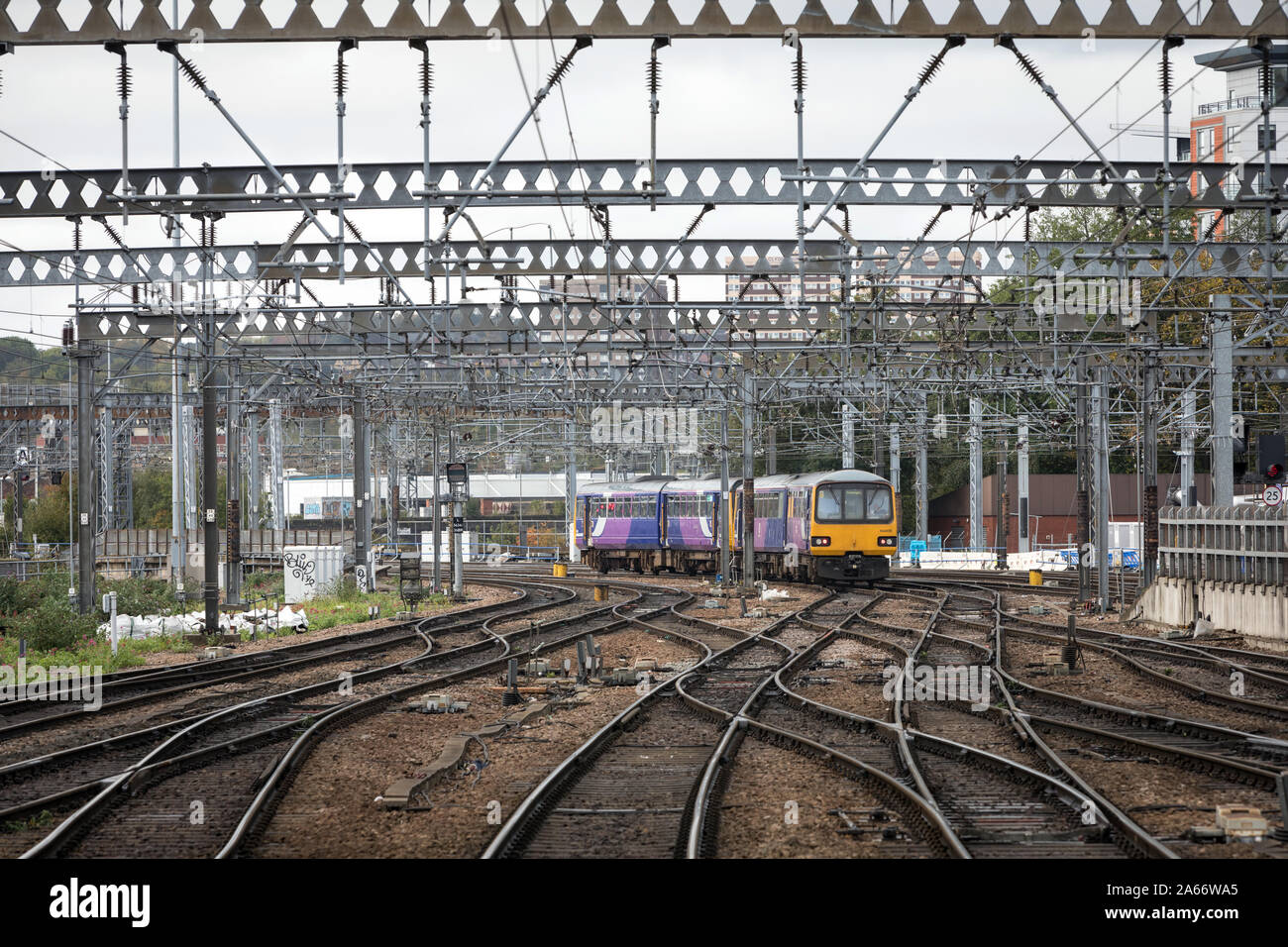 A Northern Rail train made up of ageing Pacer units leaves Leeds station heading for Knottingley in West Yorkshire Stock Photo