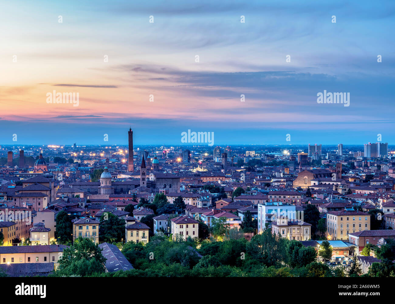 Cityscape with San Domenico Basilica and Asinelli Tower at dusk, elevated view, Bologna, Emilia-Romagna, Italy Stock Photo