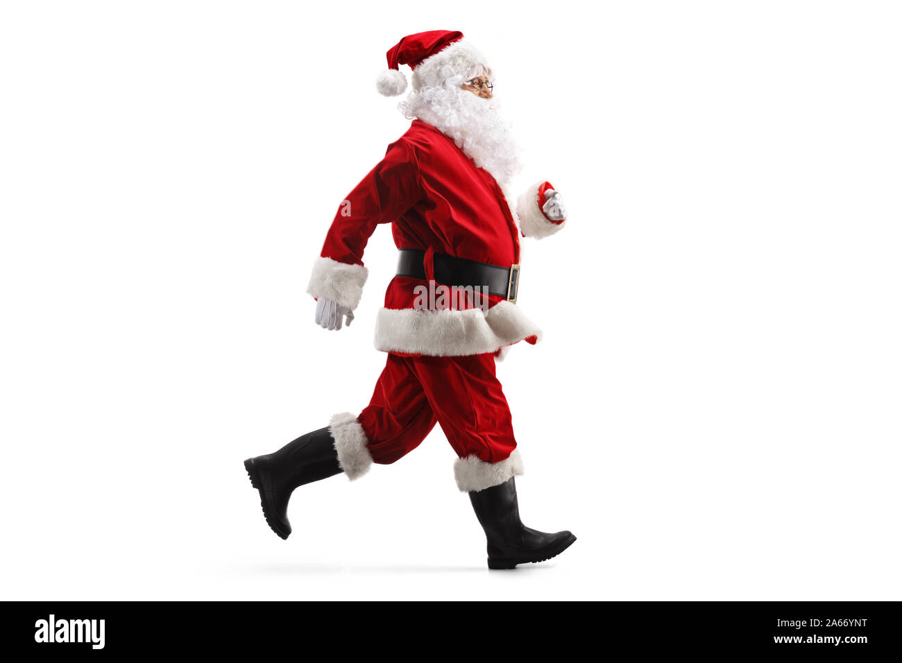 Full length profile shot of Santa Claus running fast isolated on white background Stock Photo