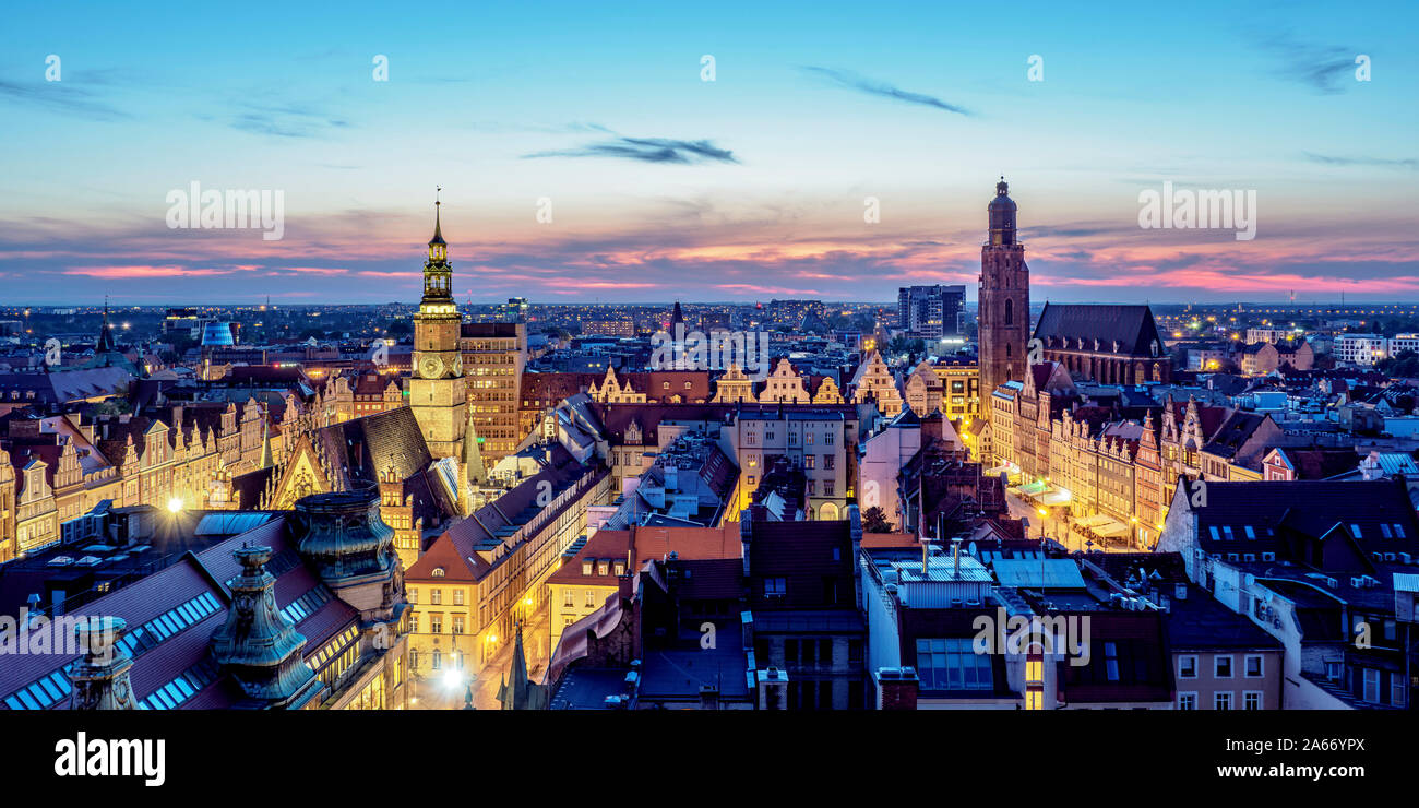 Skyline with Old Town Hall and St. Elizabeth Church at dusk, elevated view, Wroclaw, Lower Silesian Voivodeship, Poland Stock Photo