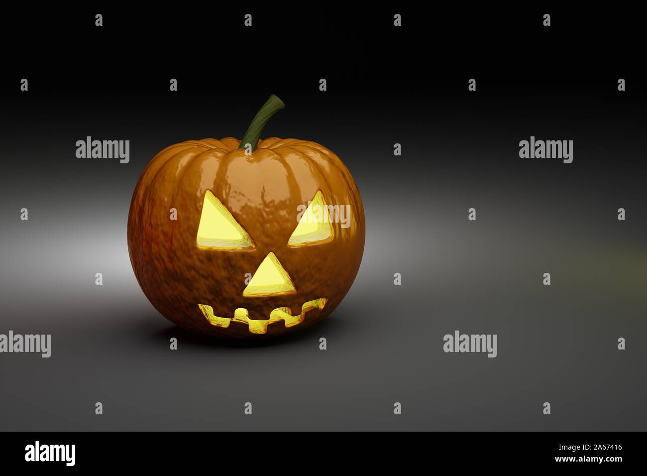 Jack O Lantern halloween pumpkin on black background with light ...