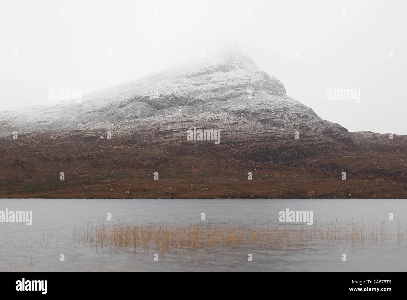 Sgorr Tuath mountain and Loch Lurgainn in March, Wester Ross Stock Photo