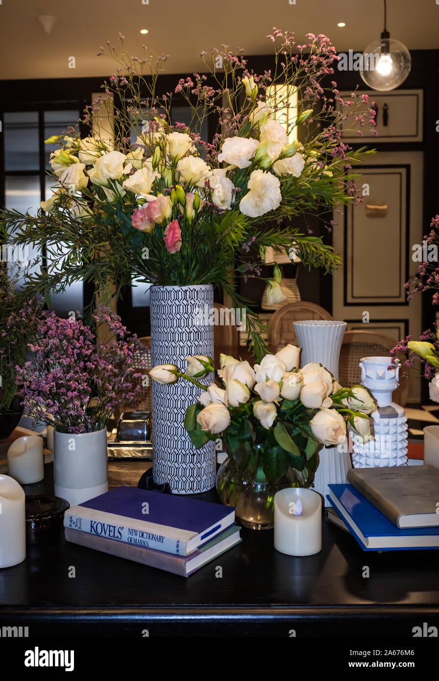 Bangkok,Thailand-03 APR 2018: Vintage flower vase display on the table Stock Photo
