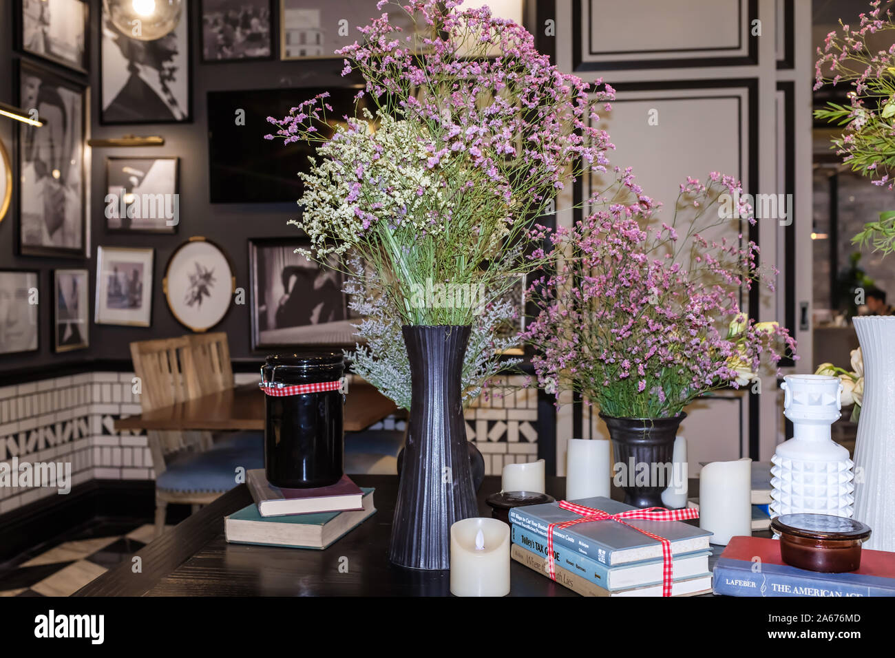 Bangkok,Thailand-03 APR 2018: Vintage flower vase display on the table Stock Photo