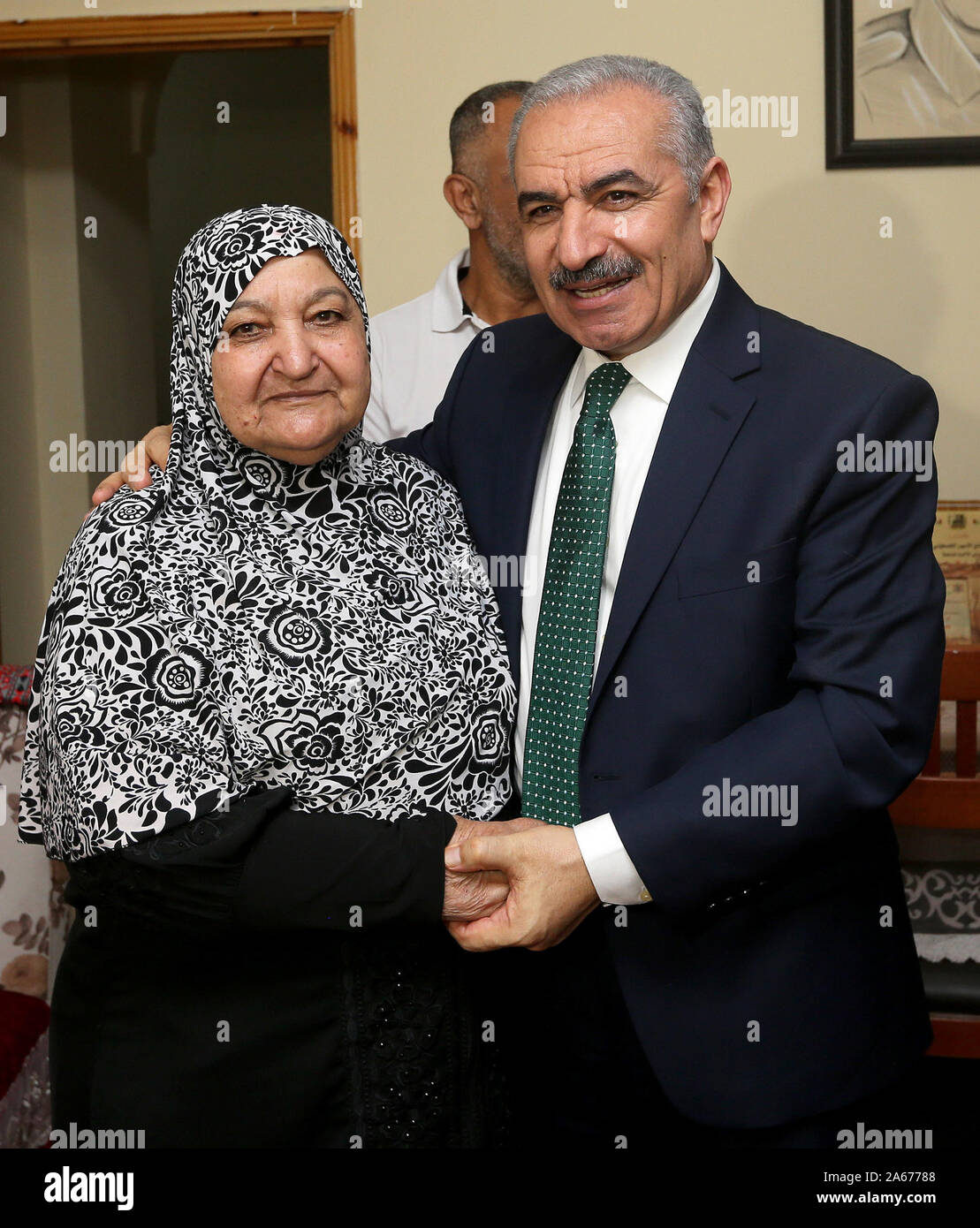 October 24, 2019, Ramallah, West Bank, Palestinian Territory: Palestinian Prime Minister Mohammad Ishtayeh, visits the fighter Umm Nasser Abu Homed, in the West Bank city of Ramallah, on October 24, 2019  (Credit Image: © Prime Minister Office/APA Images via ZUMA Wire) Stock Photo