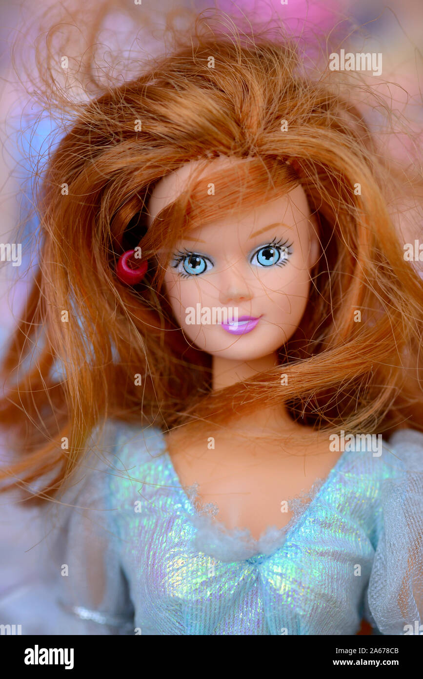 Close-up of a Barbie Doll Face with Brown Hair Stock Photo