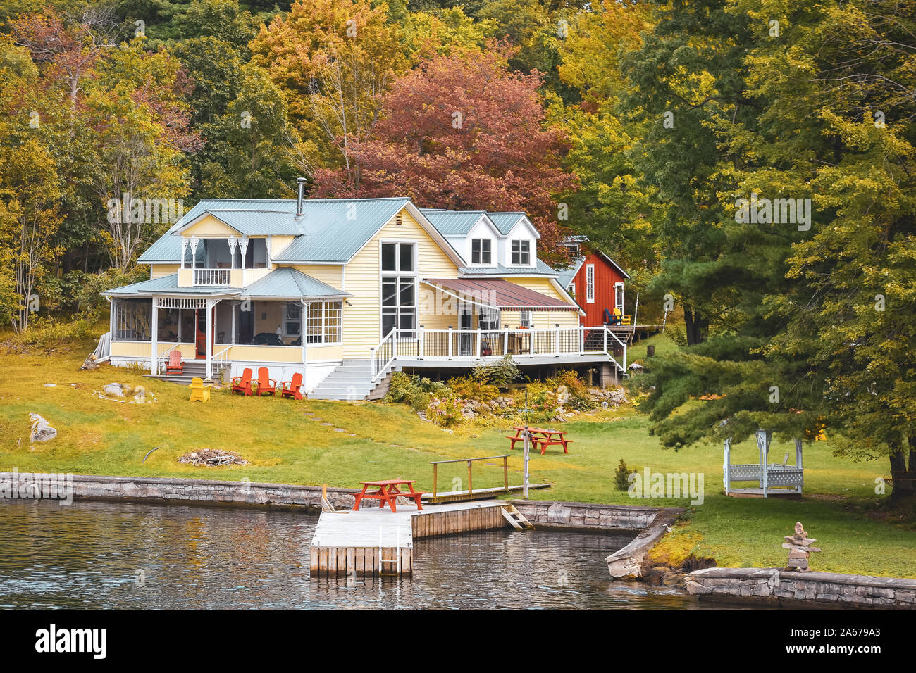 Autumn landscape in the 1000 islands. Houses, boats and islands. Lake Ontario, Canada USA Stock Photo