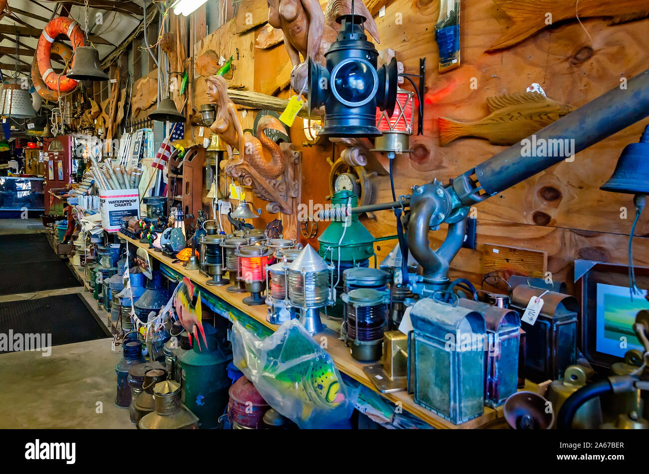 Nautical souvenirs and memorabilia are crowded onto shelves at The Tin Shed, Oct. 6, 2019, in Apalachicola, Florida. Stock Photo