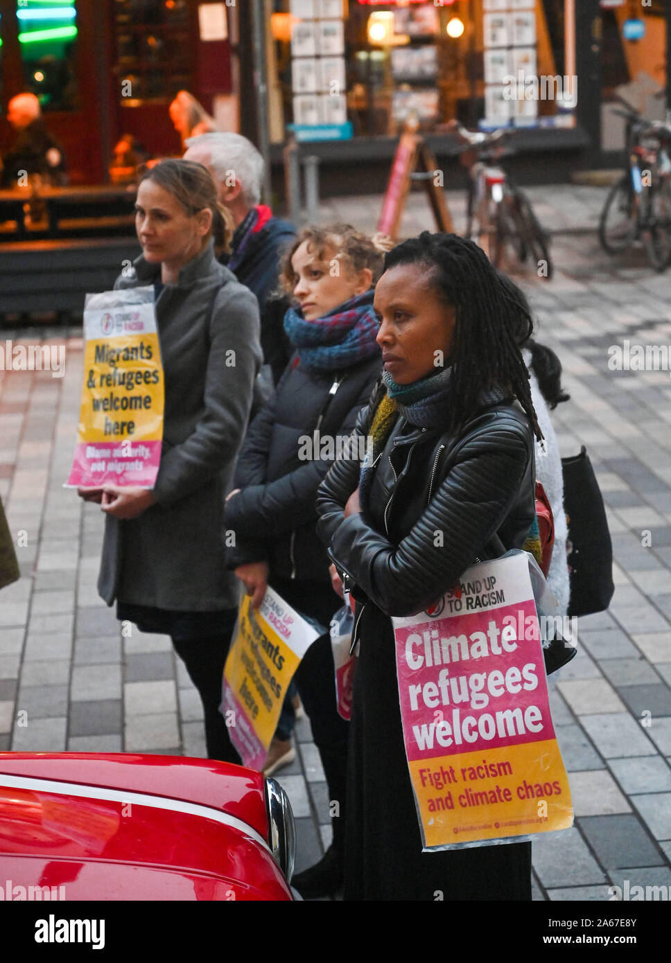 Brighton UK 24 October 2019 - A vigil to remember the 39 people who lost their lives in a lorry container is held in Brighton tonight . The bodies of the people, believed to be Chinese and Vietnamese Nationals, were found in Essex in a lorry container yesterday morning. Campaigners are holding a vigil on the steps of the Brighton Unitarian Church to remember the dead. . Credit : Simon Dack / Alamy Live News Stock Photo