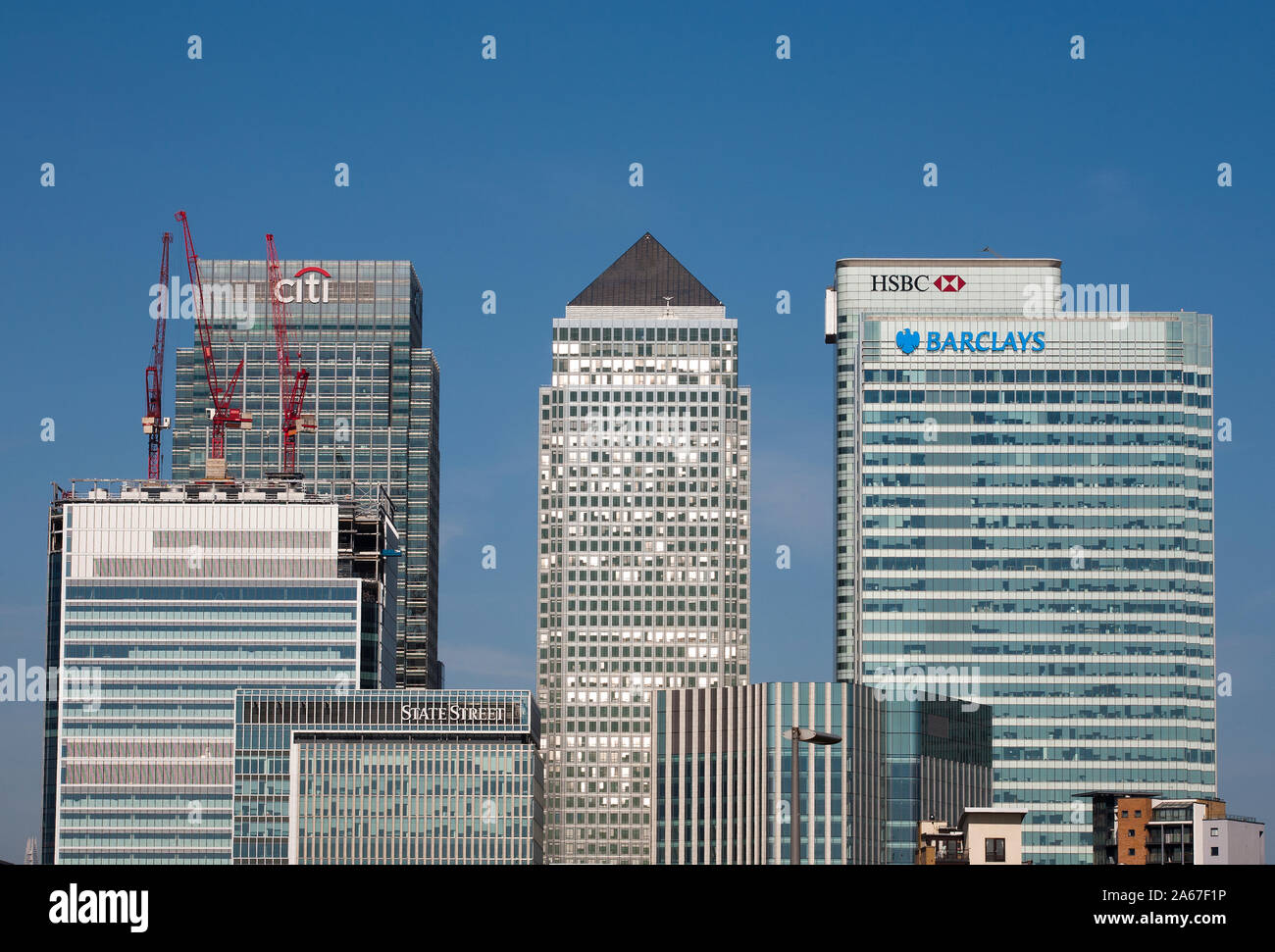 City skyline showing Canary wharf buildings against a blue sky Stock ...