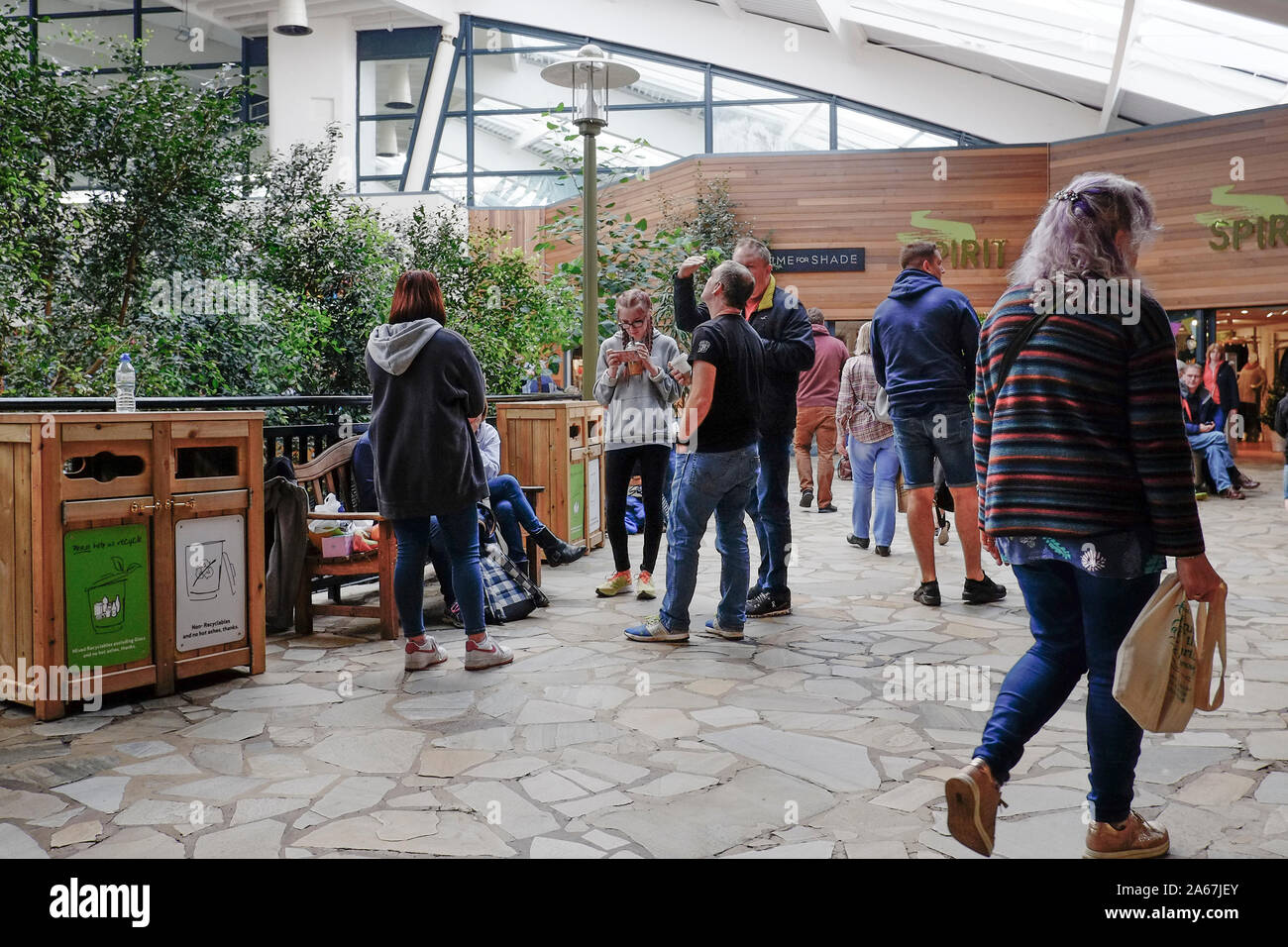 Visitors in The Plaza area of Longleat Center Parc in Wiltshire. Stock Photo