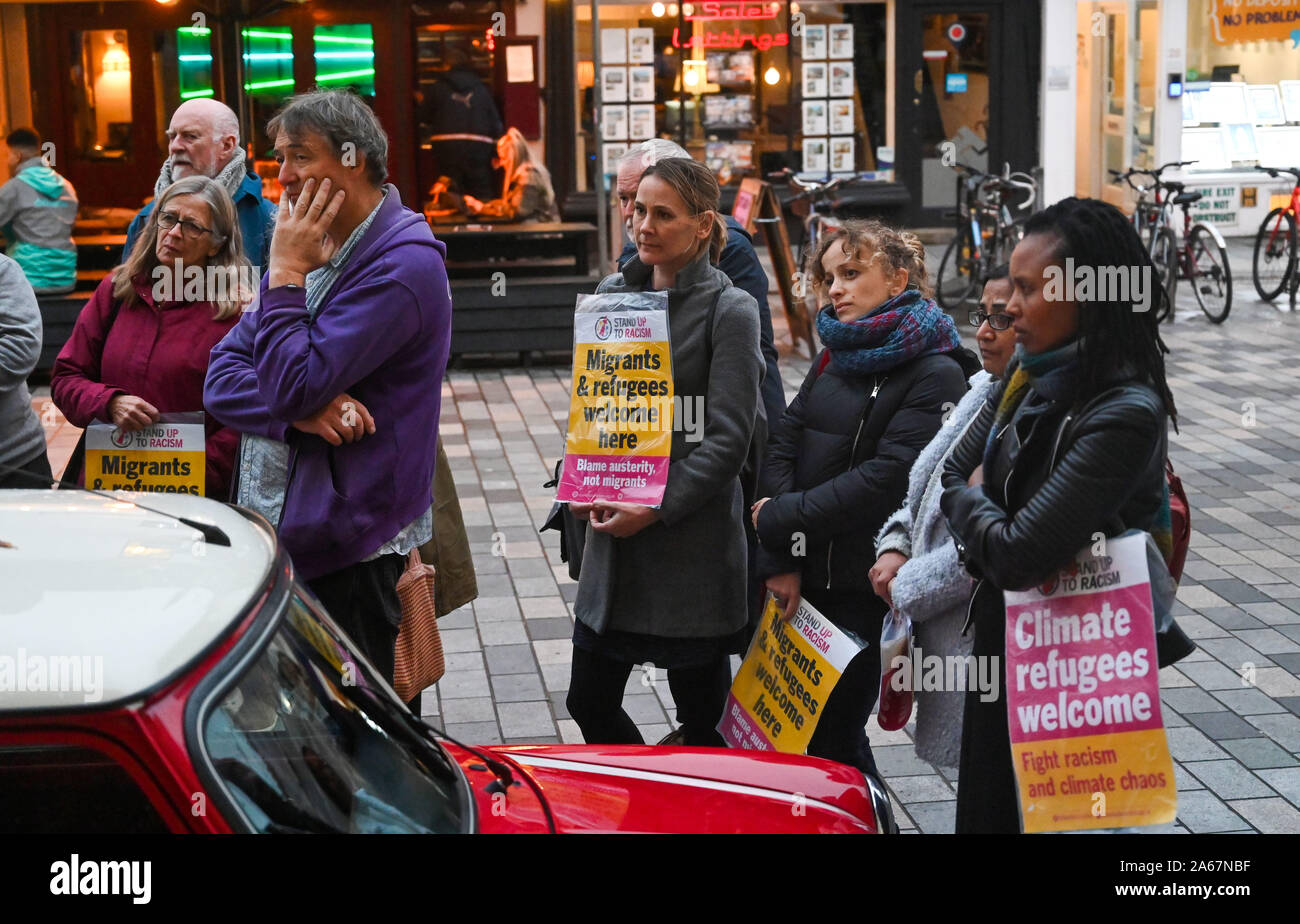 Brighton UK 24 October 2019 - A vigil to remember the 39 people who lost their lives in a lorry container is held in Brighton tonight . The bodies of the people, believed to be Chinese and Vietnamese Nationals, were found in Essex in a lorry container yesterday morning. Campaigners are holding a vigil on the steps of the Brighton Unitarian Church to remember the dead. . Credit : Simon Dack / Alamy Live News Stock Photo