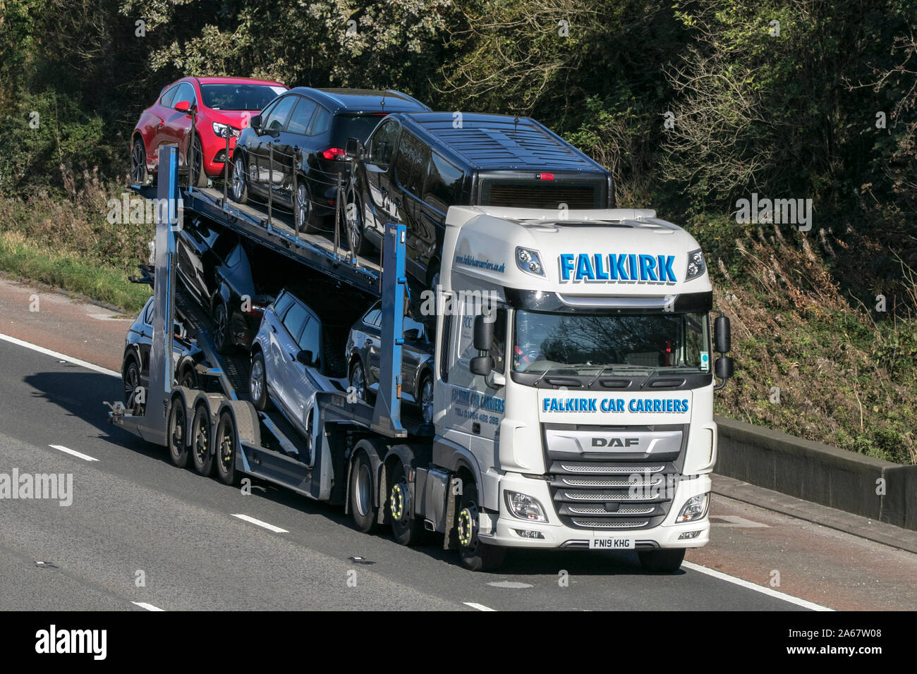 Falkirk car carriers DAF articulated traveling on the M6 motorway near Preston in Lancashire, UK Stock Photo