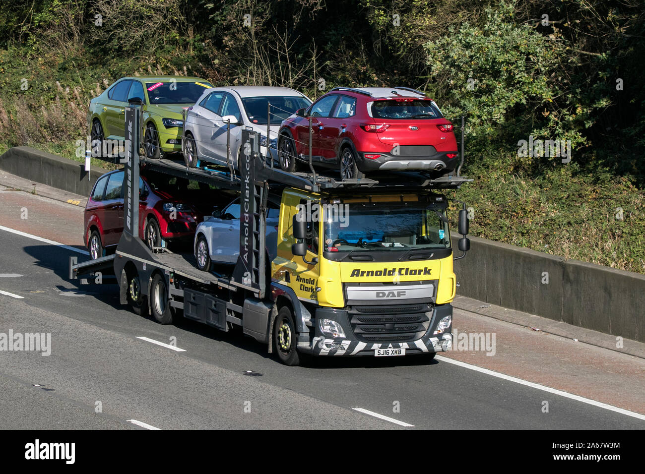 Arnold Clark Daf rigid car carrier traveling on the M6 motorway near Preston  in Lancashire, UK Stock Photo - Alamy