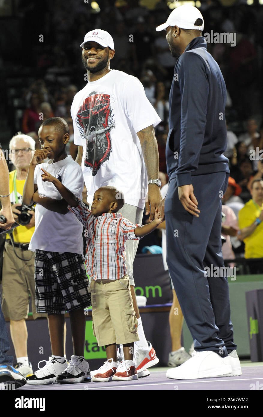 MIAMI, FL - JULY11: BREAKING NEWS: Lebron James leaves Miami and heads back to Cleveland Cavaliers on July 11, 2014 EDITORS NOTE: Orig picture taken 2009 People: LeBron James and Dwyane Wade with sons Credit: Storms Media Group/Alamy Live News Stock Photo