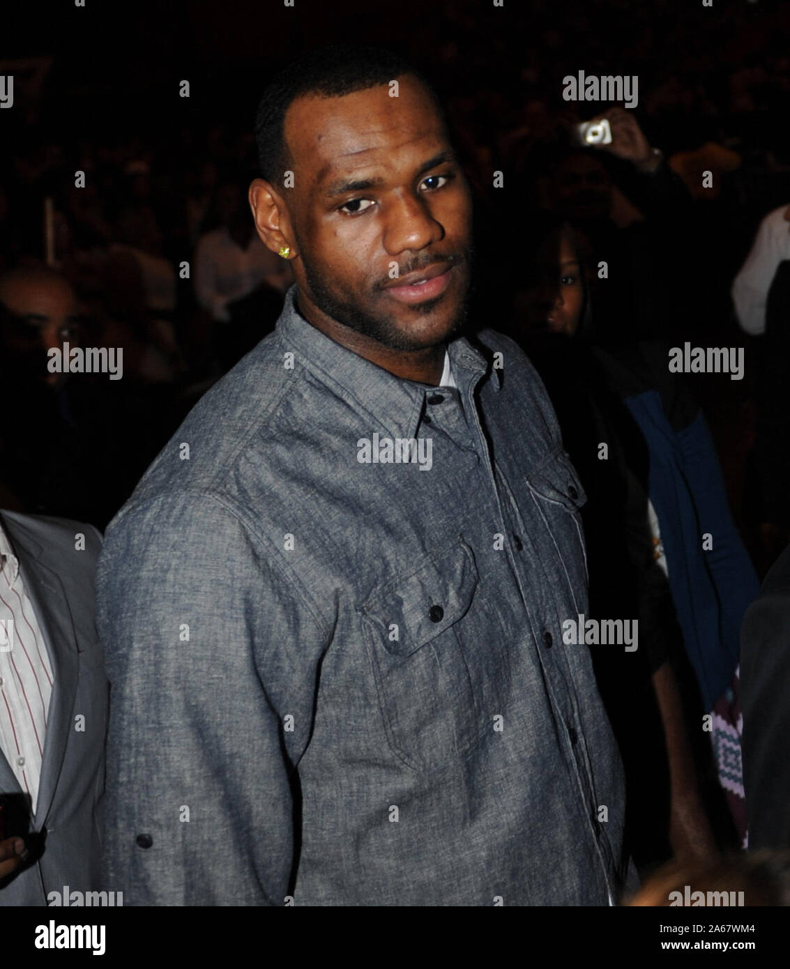 MIAMI BEACH, FL - DECEMBER 31: (EXCLUSIVE COVERAGE) LeBron James watches Usher (AKA Ursher Raymond IV (born October 14, 1978)  performs at AmericanAirlines Arena New Years Eve with special guest Trey Songz on December 31, 2010 in Miami, Florida  People:   LeBron James Stock Photo