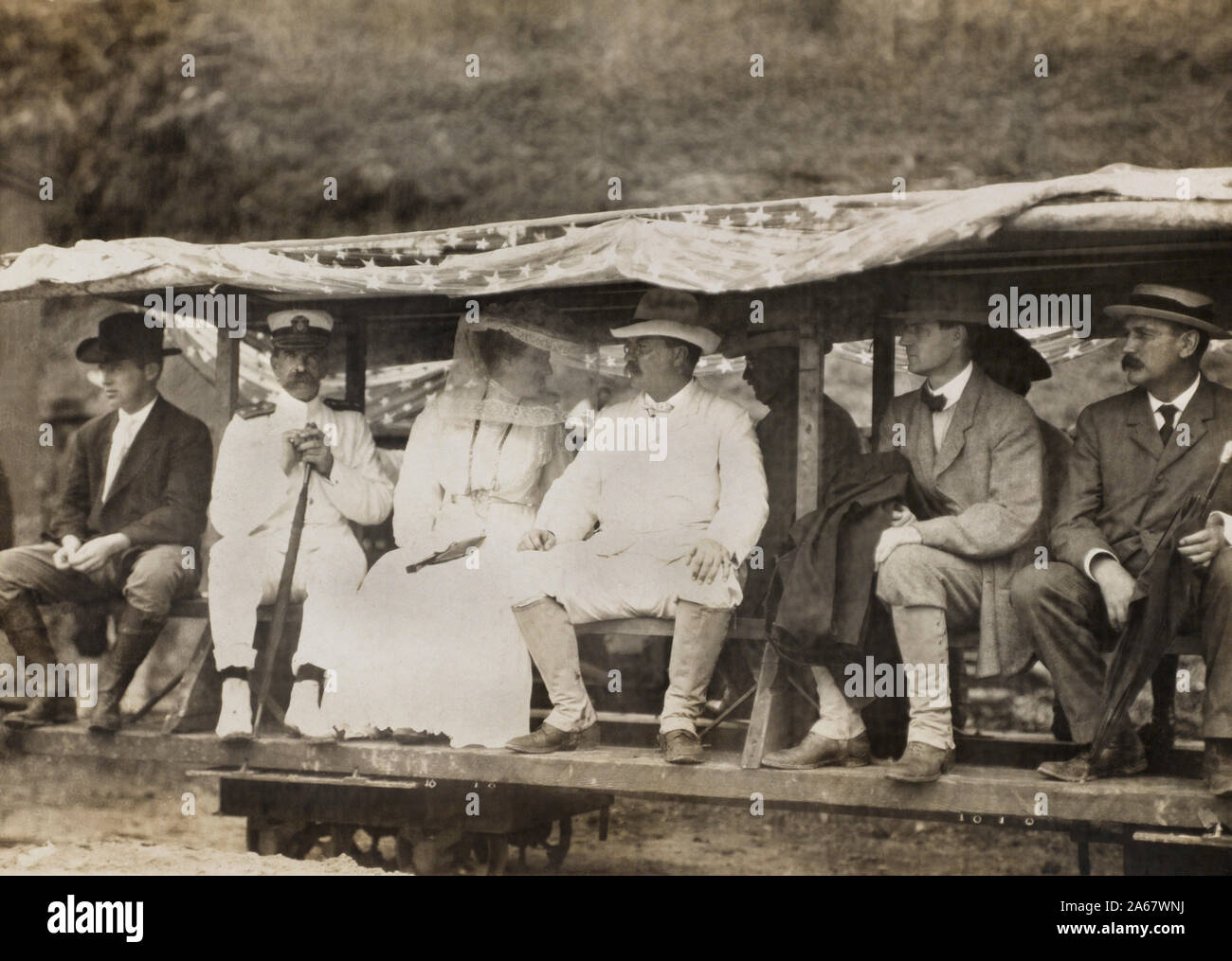 U.S. President Theodore Roosevelt and Wife Edith Roosevelt inspecting Canal Work from Narrow Gauge Train, L-R: Engineer J. G. Holcombe, Surgeon General Rear Admiral Presley Marion Rixey, Edith Roosevelt, President Roosevelt, unidentified man, John F. Stevens, Balboa Heights, Panama, Underwood & Underwood, November 1906 Stock Photo