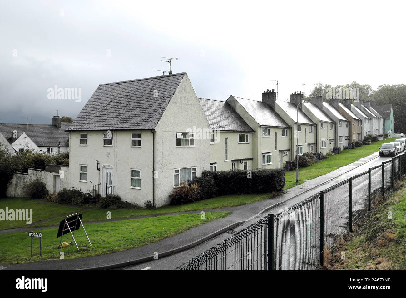 Model council housing scheme row terraced houses in Beaumaris by architect Sidney Colwyn Foulkes on Anglesey in North Wales UK  KATHY DEWITT Stock Photo