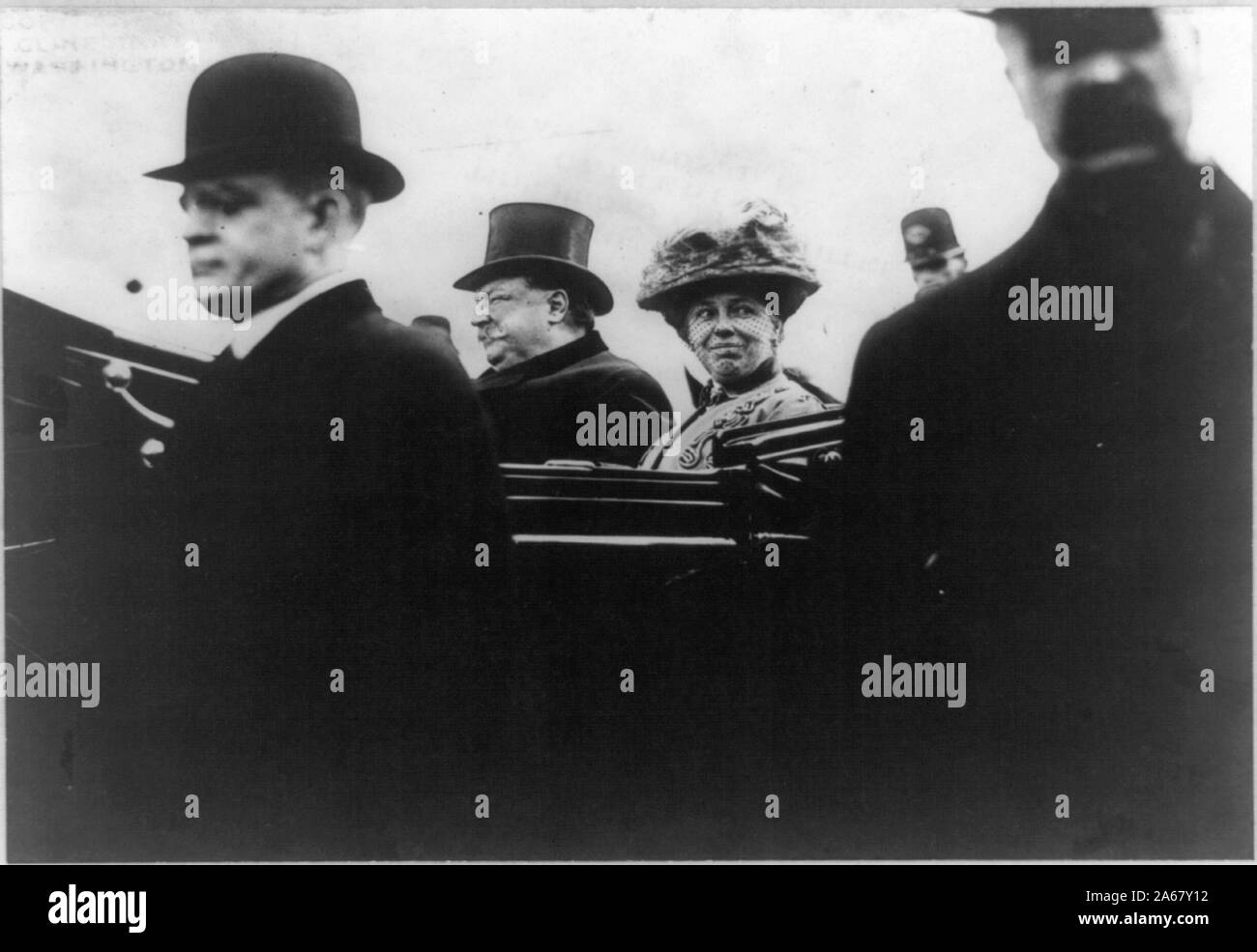William Howard Taft, head-and-shoulders portrait, facing left; in car with his wife on Inauguration Day Stock Photo