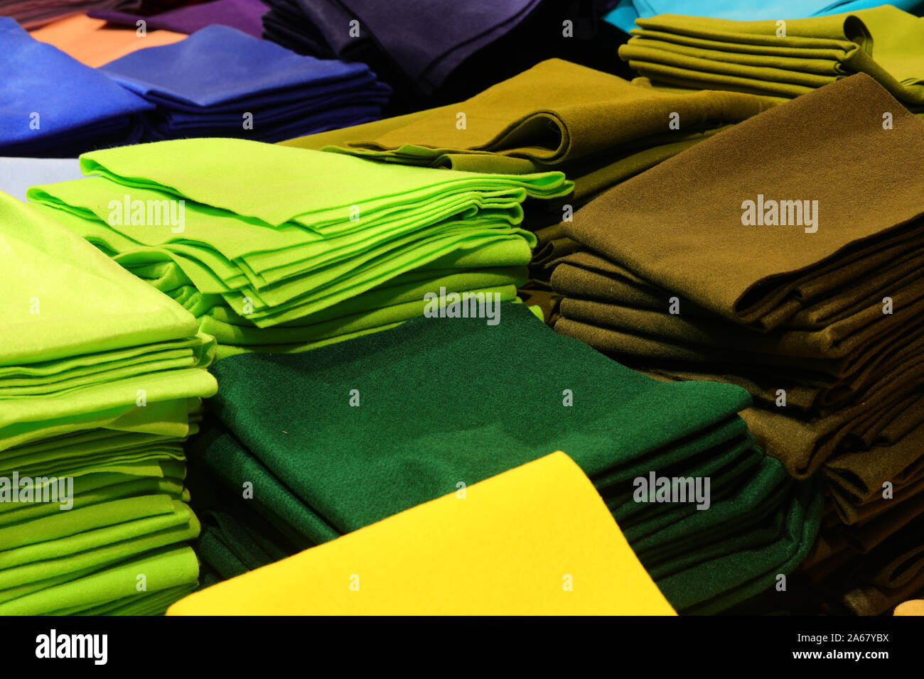 heap of many fabric for sale at store for hobbyst Stock Photo Alamy