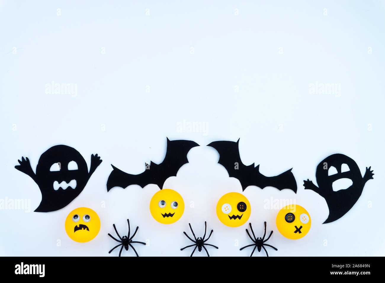 Top view of Halloween decoration, jack o lantern, ghost, bat and spider ...