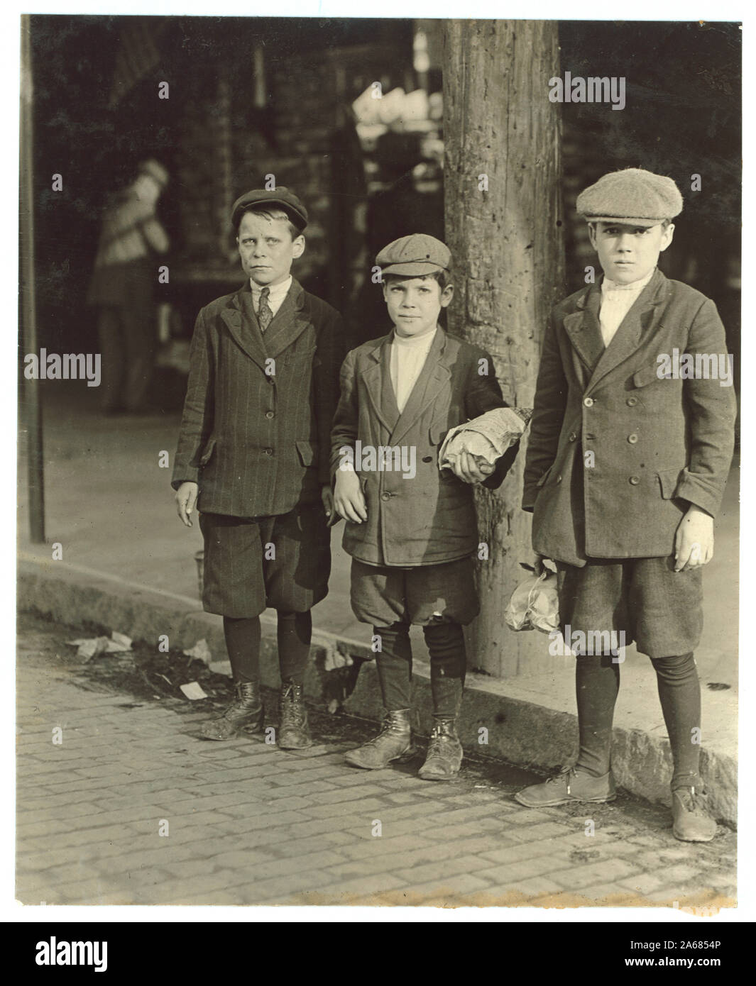 Wilson Dry Goods Company, large department store. Employs large number of youngsters as cashboys and wrappers. Counted seven apparently 9 to 12 years old, one 9 and other 10. Week's work consists of nearly 65 hours, usually. Abstract: Photographs from the records of the National Child Labor Committee (U.S.) Stock Photo