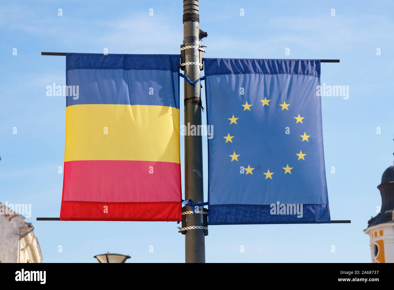 Street lantern with the Flags of the European Union (EU) and Romania at