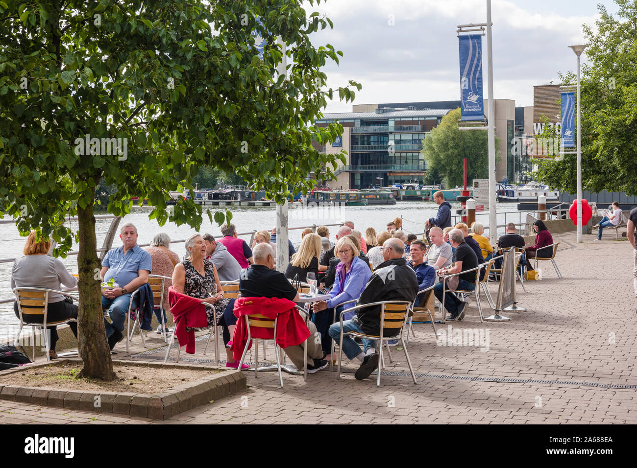 Tourists enjoying refreshments on Brayford Waterside in Lincoln England UK in September Stock Photo