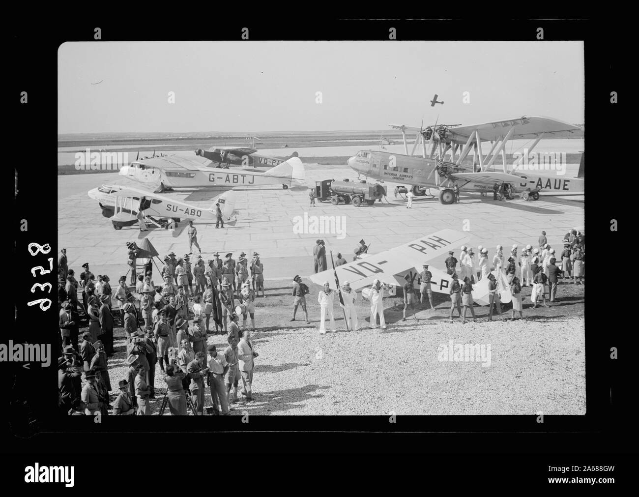 Wings over Palestine-Certificates of Flying School, April 21, 1939. Lydda runway showing air liners, etc., & test plane just taken off [Lydda Air Port] Stock Photo