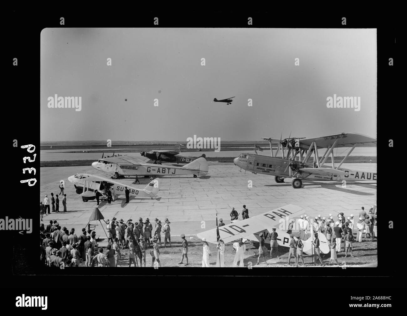 Wings over Palestine-Certificates of Flying School, April 21, 1939. Lydda runway showing air liners, etc., & test plane just taken off [Lydda Air Port] Stock Photo