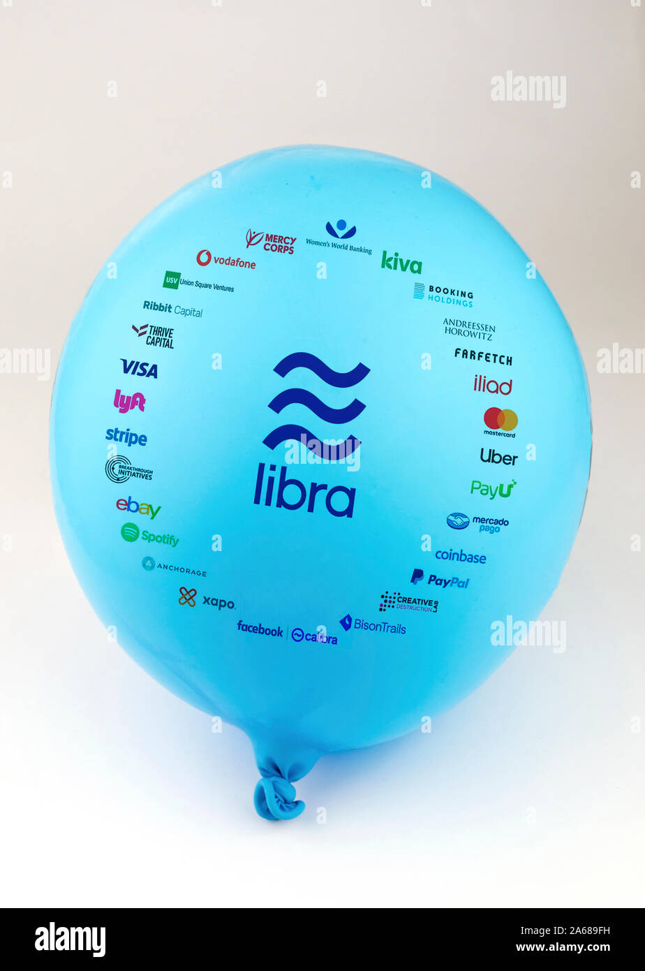 Libra Association logo printed on a balloon. The balloon is gradually deflating and losing its shape. Conceptual photo illustrative for Libra project. Stock Photo