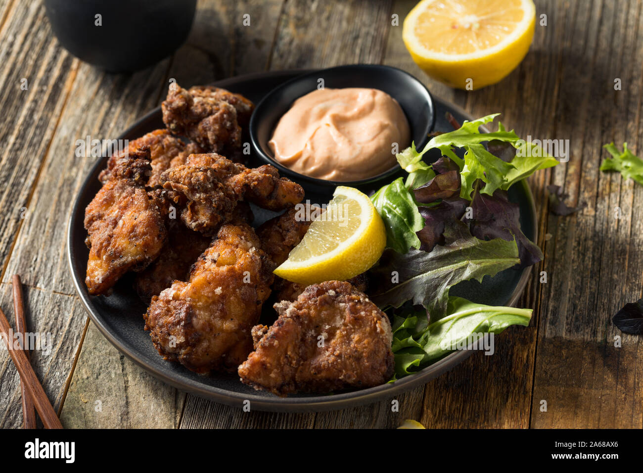 Homemade Japanese Fried Chicken Karaage with Mayo and Lemon Stock Photo