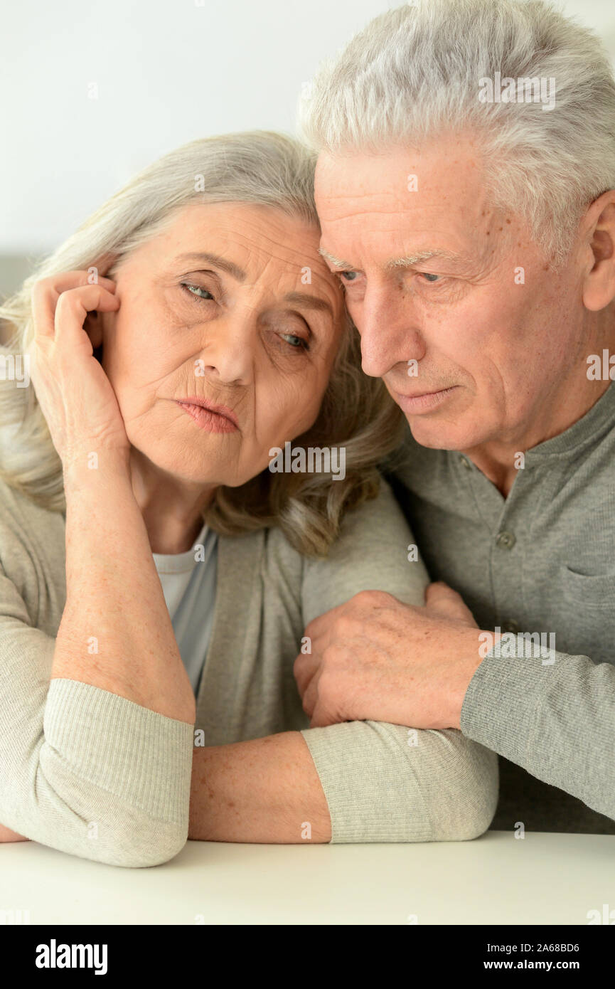 Close up portrait of sad senior couple Stock Photo