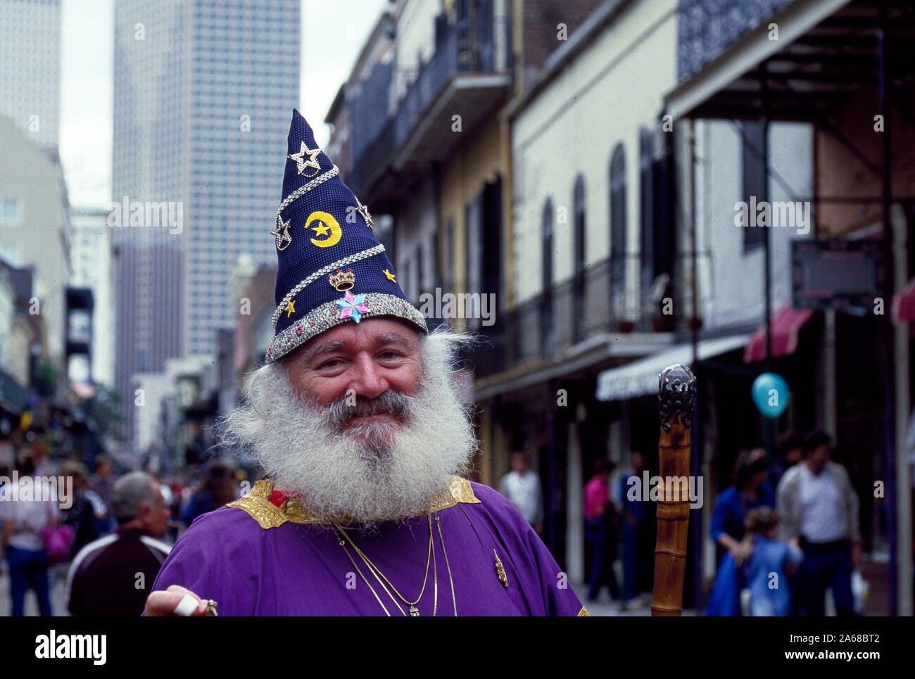 Wizard and his Wishing Well on Bourbon Street, New Orleans, Louisiana Note: Despite the title, the view is clearly Royal Street (not Bourbon 1 block away). Shown is streetcape at the 600 block or Royal, photo taken at or near intersection with St. Peter Street, looking upriver towards Canal Street Stock Photo