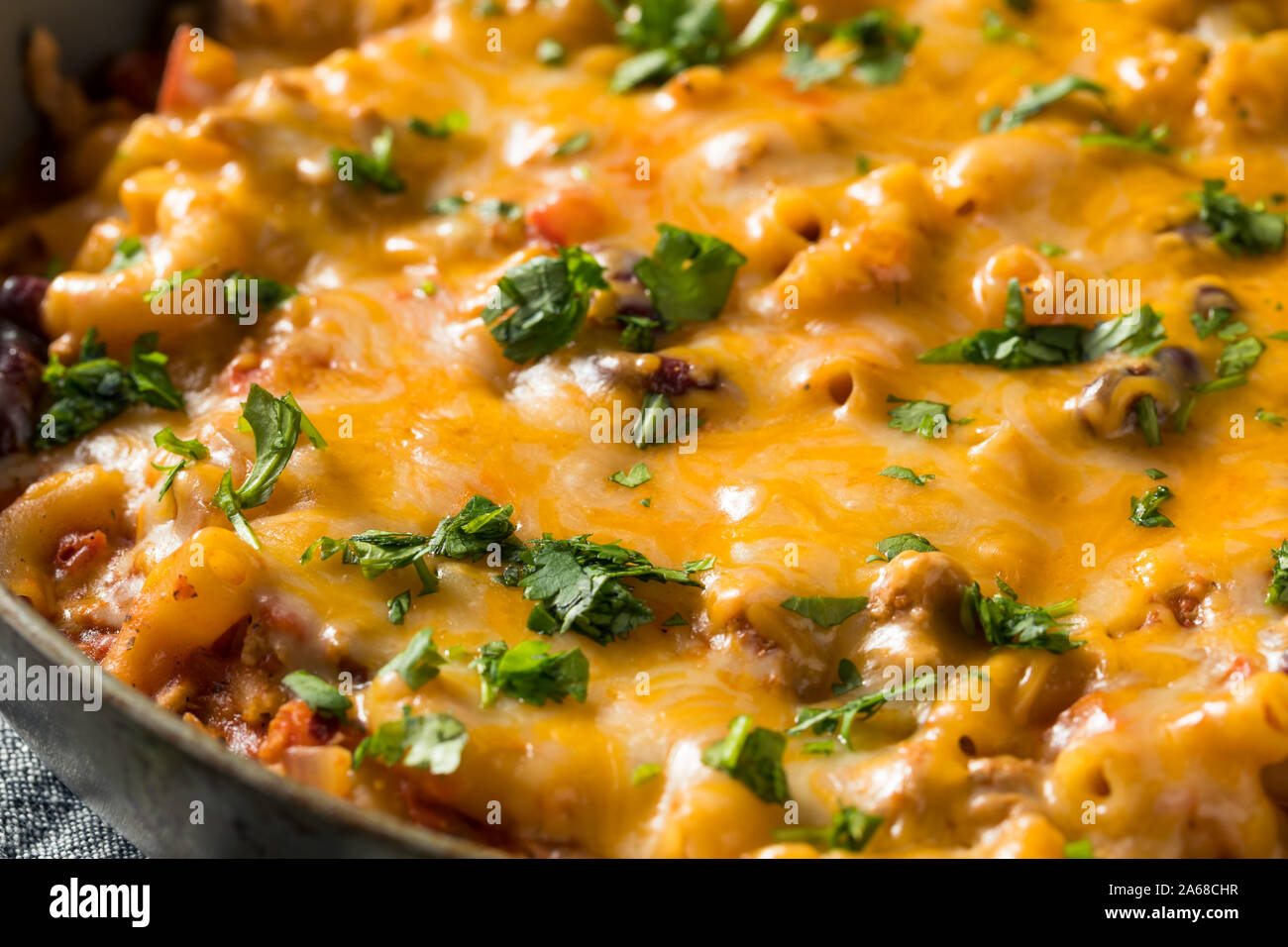 Homemade Chili Mac and Cheese with Cilantro Stock Photo