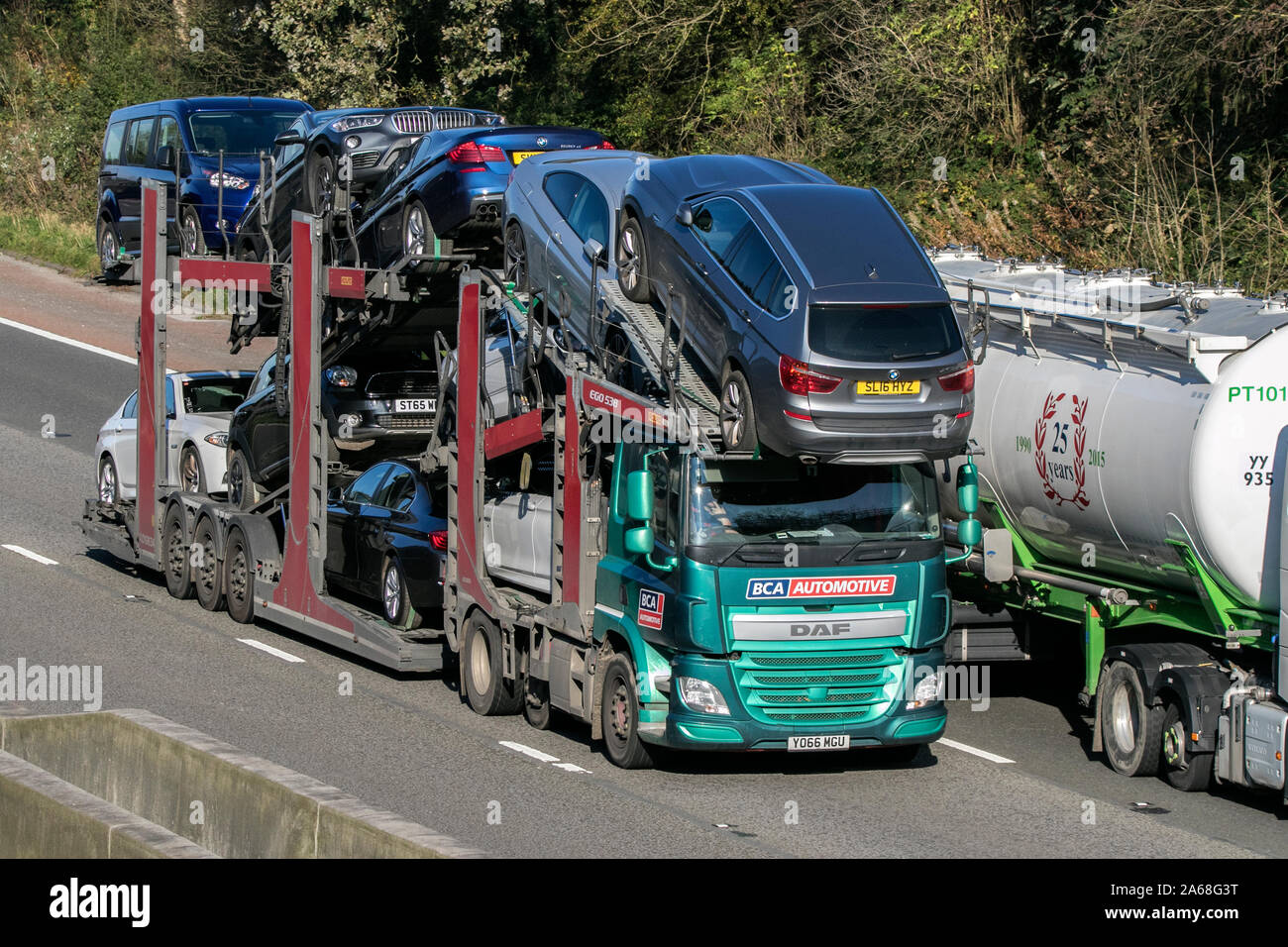 A DAF british car auctions car carrier or transporter traveling on the M6 motorway near Preston in Lancashire, UK Stock Photo