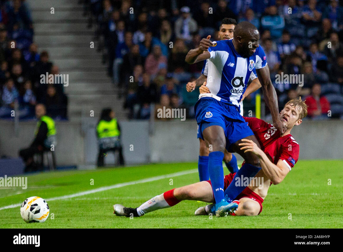 FC Porto's player Moussa Marega (L) and Ranger's player Filip Helander (R) are seen in action during the UEFA Europa League match at Dragon Stadium. (Final score: FC Porto 1:1 Rangers) Stock Photo