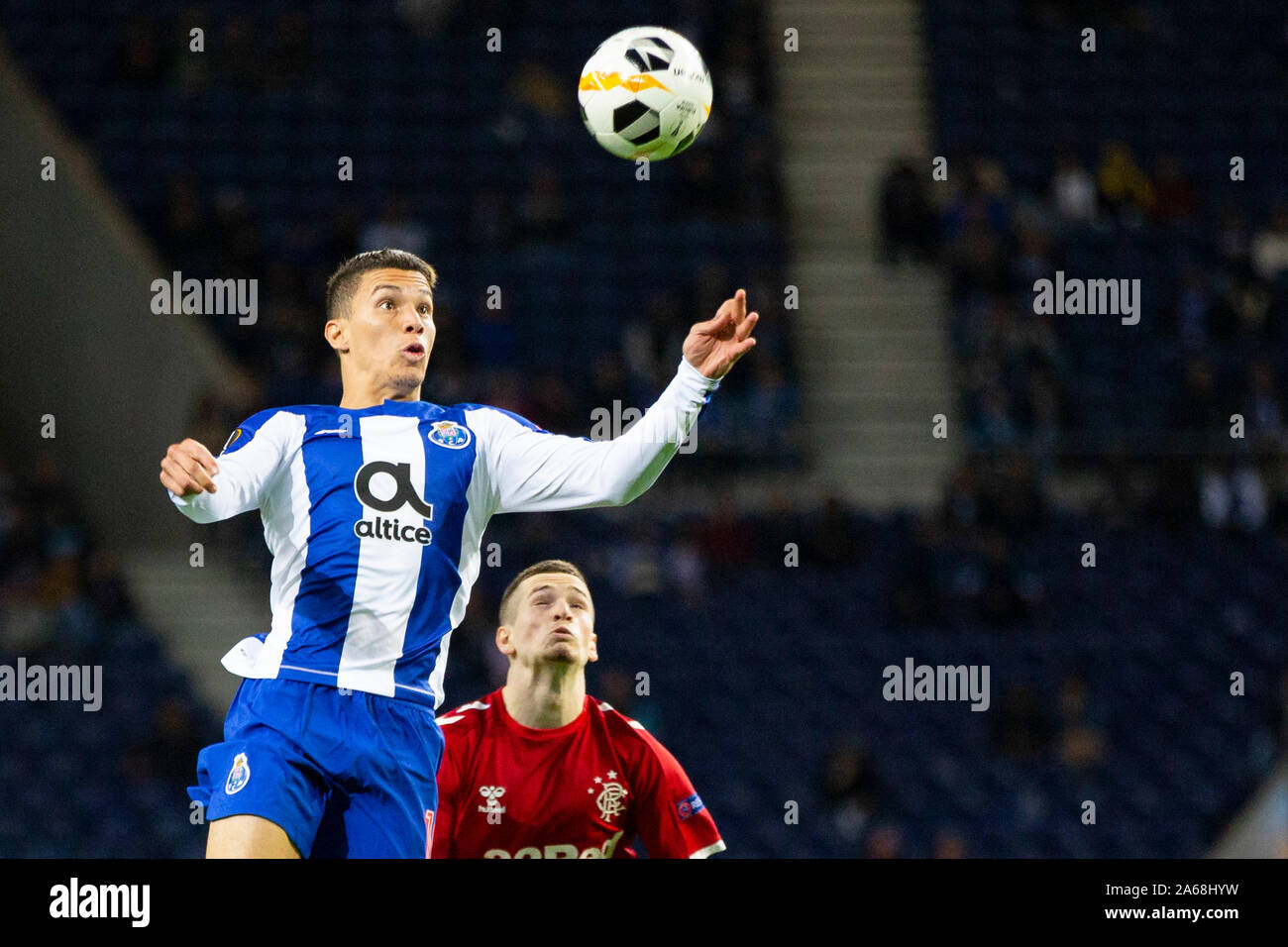 FC Porto's player, Mateus Uribe (L) and Ranger's player, Ryan Kent (R) are seen in action during the UEFA Europa League match at Dragon Stadium. (Final score: FC Porto 1:1 Rangers) Stock Photo