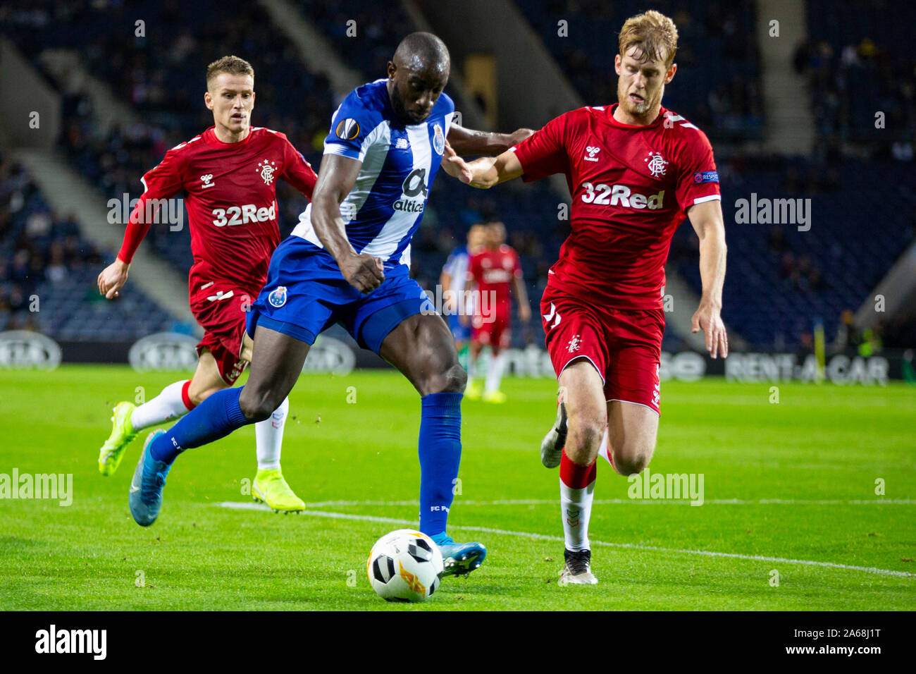 FC Porto's player Moussa Marega (L) and Ranger's player Filip Helander (R) are seen in action during the UEFA Europa League match at Dragon Stadium. (Final score: FC Porto 1:1 Rangers) Stock Photo