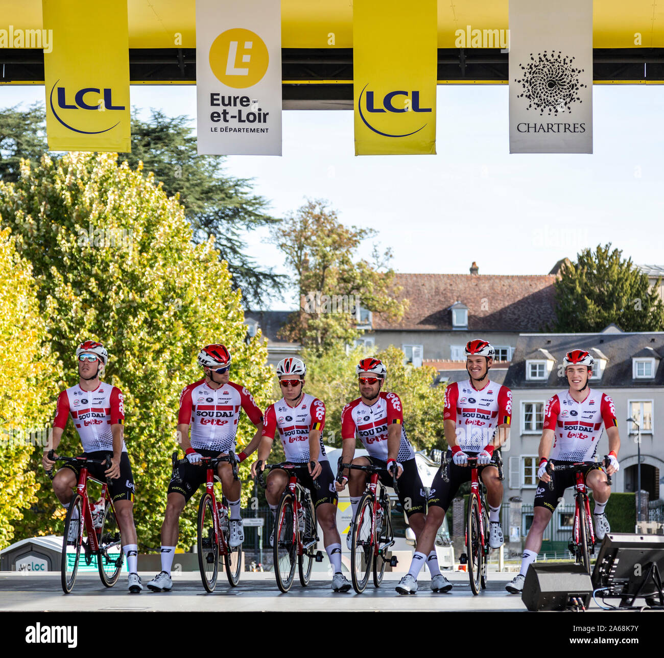 Chartres, France - October 13, 2019: Team Lotto-Soudal is on the podium in Chartres, during the teams presentation before the autumn French cycling race Paris-Tours 2019. Jelle Wallays won this race. Stock Photo