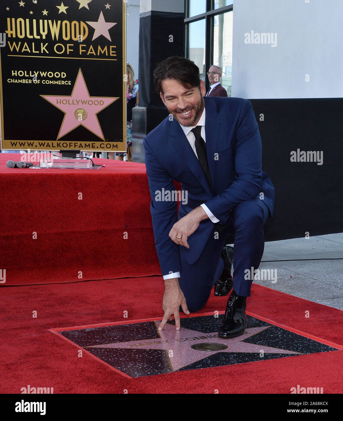 Los Angeles, United States. 24th Oct, 2019. Grammy and Emmy-award winning American singer, composer, actor, and television host Harry Connick Jr. kneels beside his star during an unveiling ceremony honoring him with the 2,678th star on the Hollywood Walk of Fame in Los Angeles on Thursday, October 24th, 2019. Connick's star is next to Cole Porter, one of his favorite songwriters. Photo by Jim Ruymen/UPI Credit: UPI/Alamy Live News Stock Photo