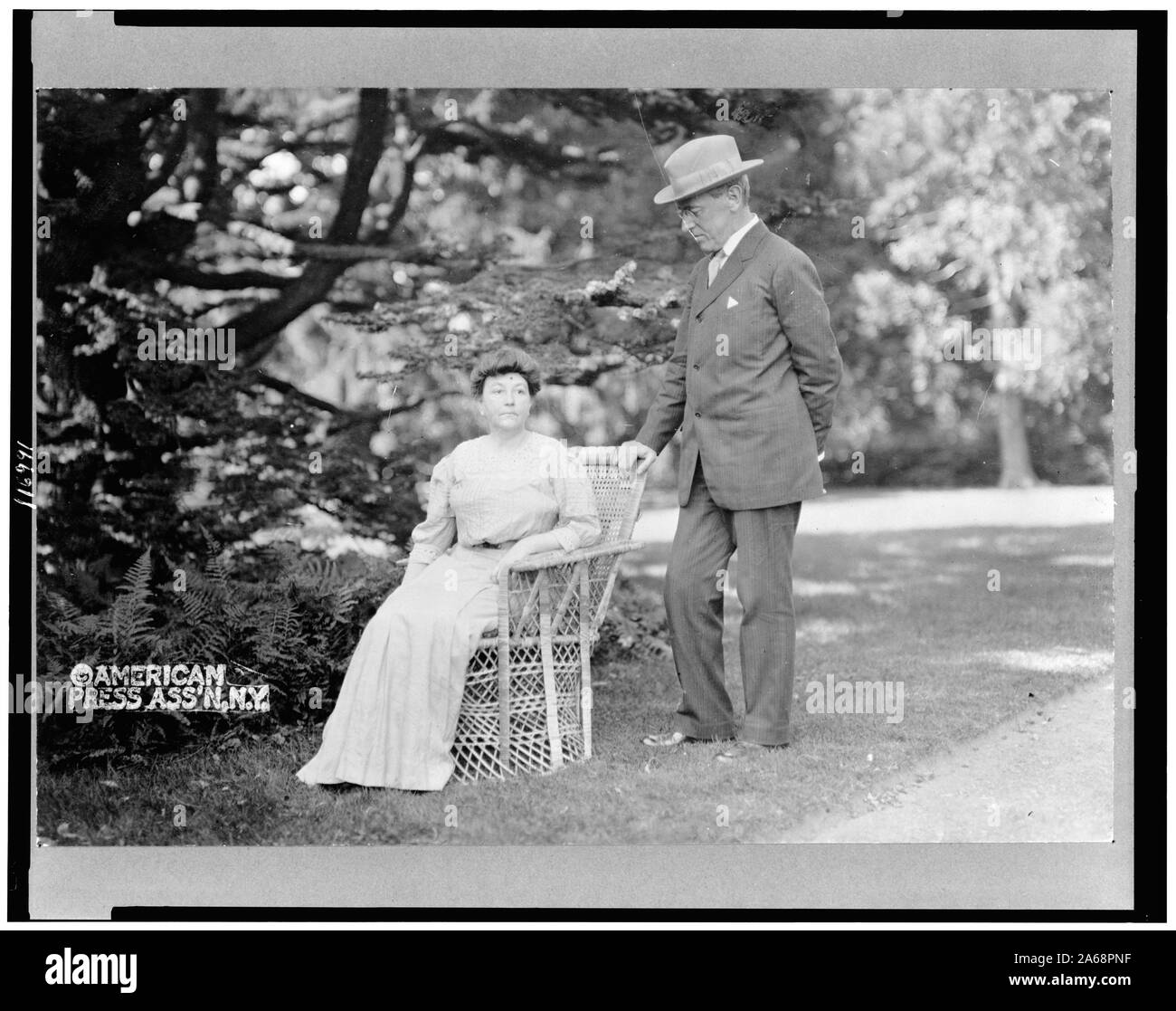 Woodrow Wilson, fulllength portrait, standing next to his wife, Ellen