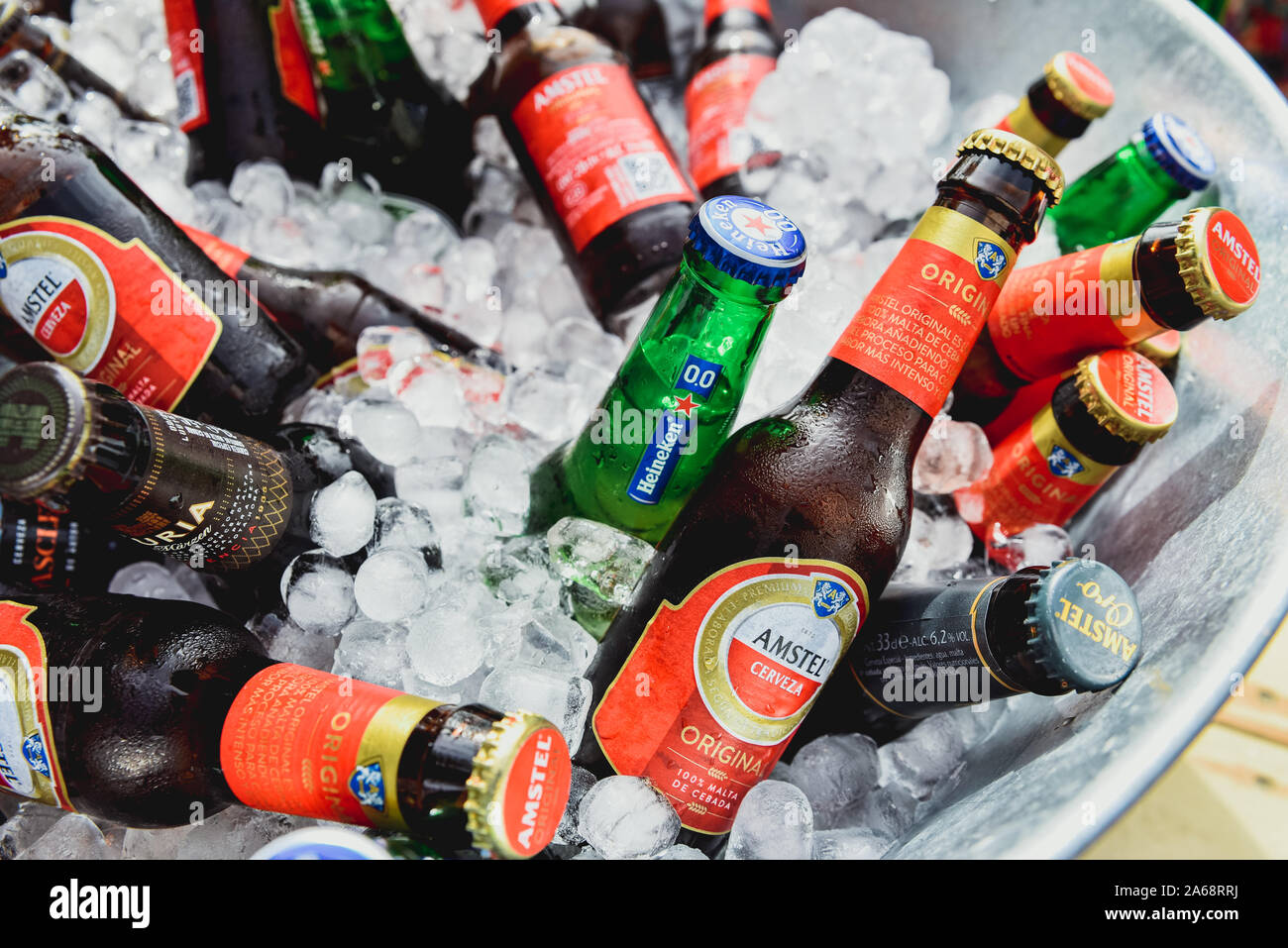 Valencia, Spain - October 12, 2019: Amstel beer bottles in a bucket with ice during a catering event. Stock Photo