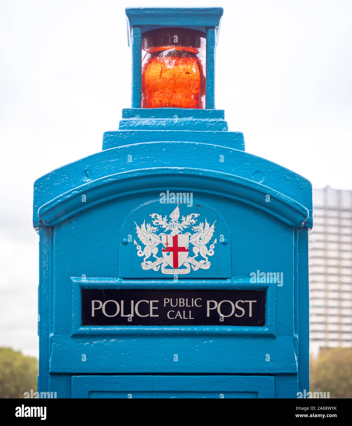 Vintage Police telephone box no longer in use, Victoria Embankment alongside the River Thames, London, UK. Stock Photo