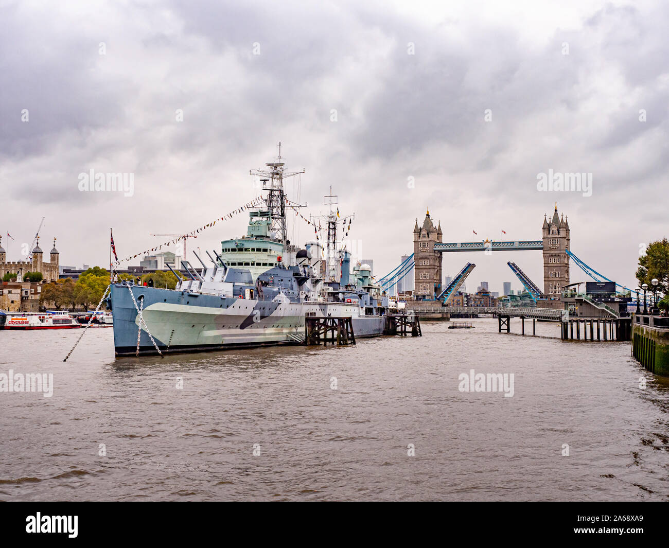 HMS Belfast, a Town-class light cruiser built for the Royal Navy. Now operated by the Imperial War Museum and permanently moored on the River Thames, Stock Photo