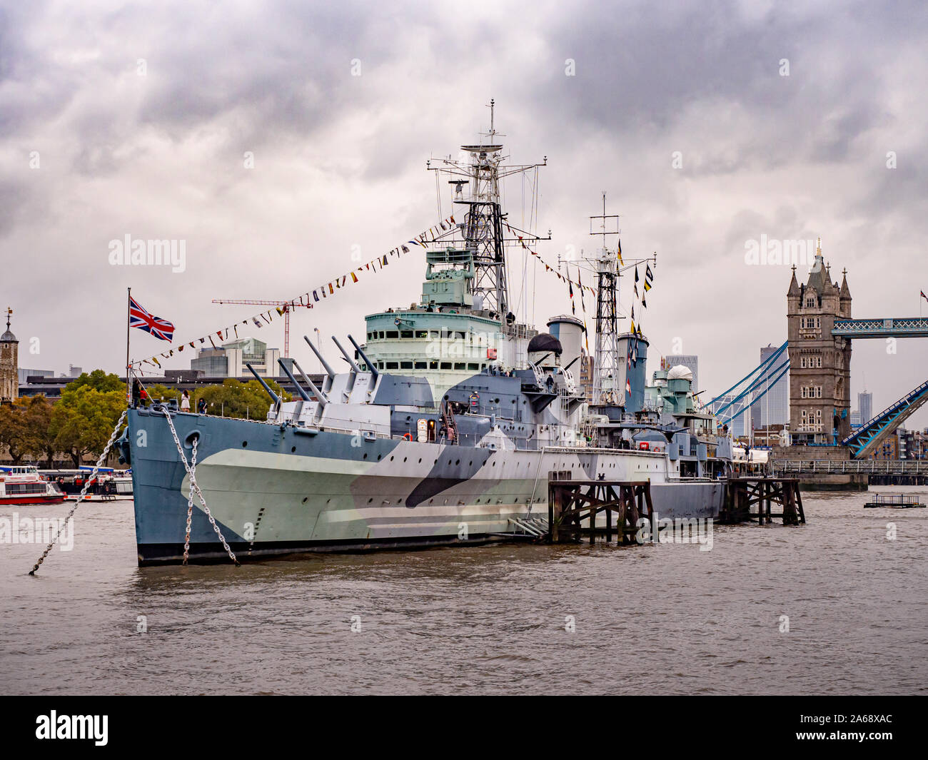 HMS Belfast, a Town-class light cruiser built for the Royal Navy. Now operated by the Imperial War Museum and permanently moored on the River Thames, Stock Photo
