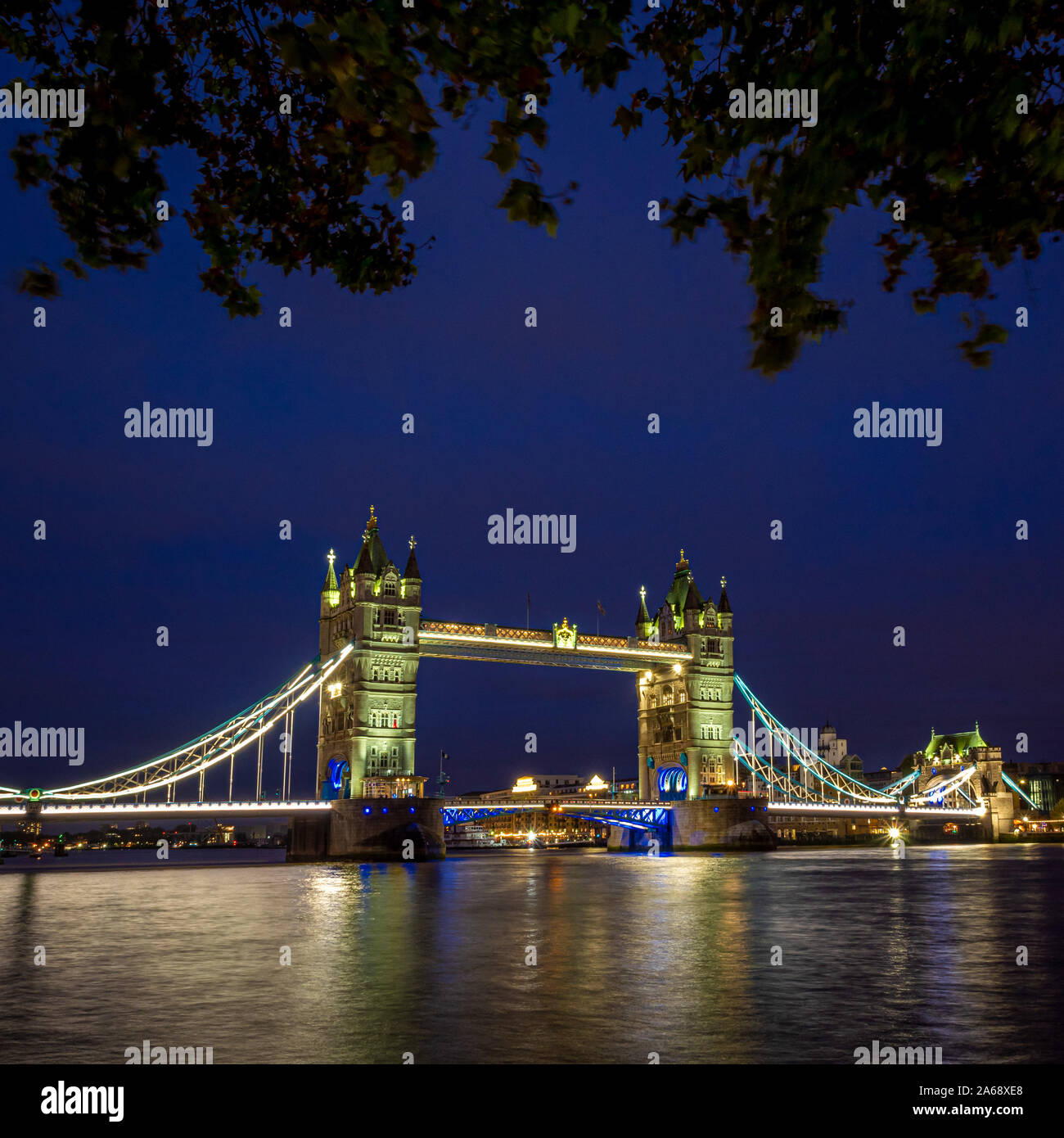 Tower Bridge over the river Thames at night, London, UK. Stock Photo