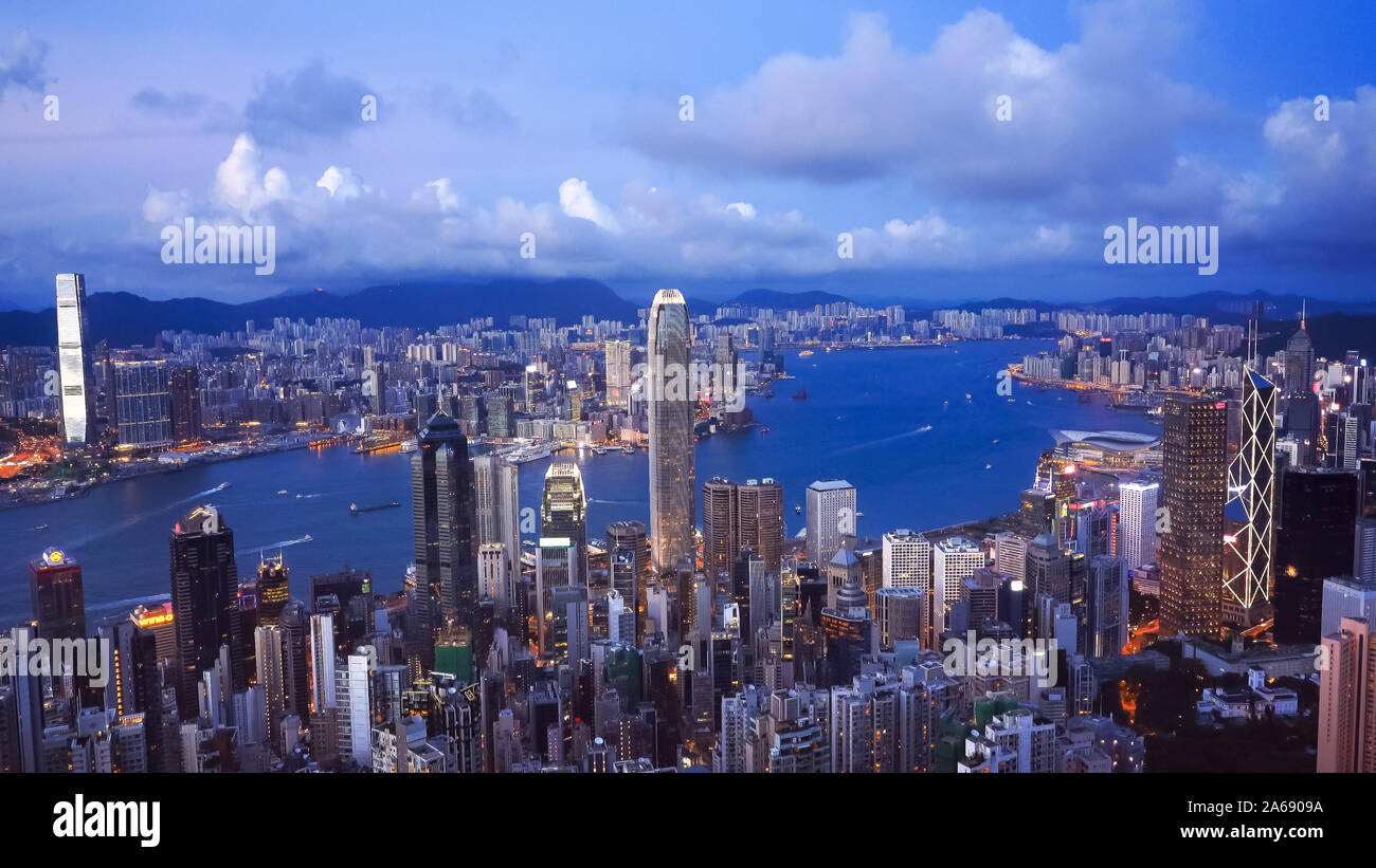 victoria harbour at dusk from the peak in hong kong Stock Photo - Alamy