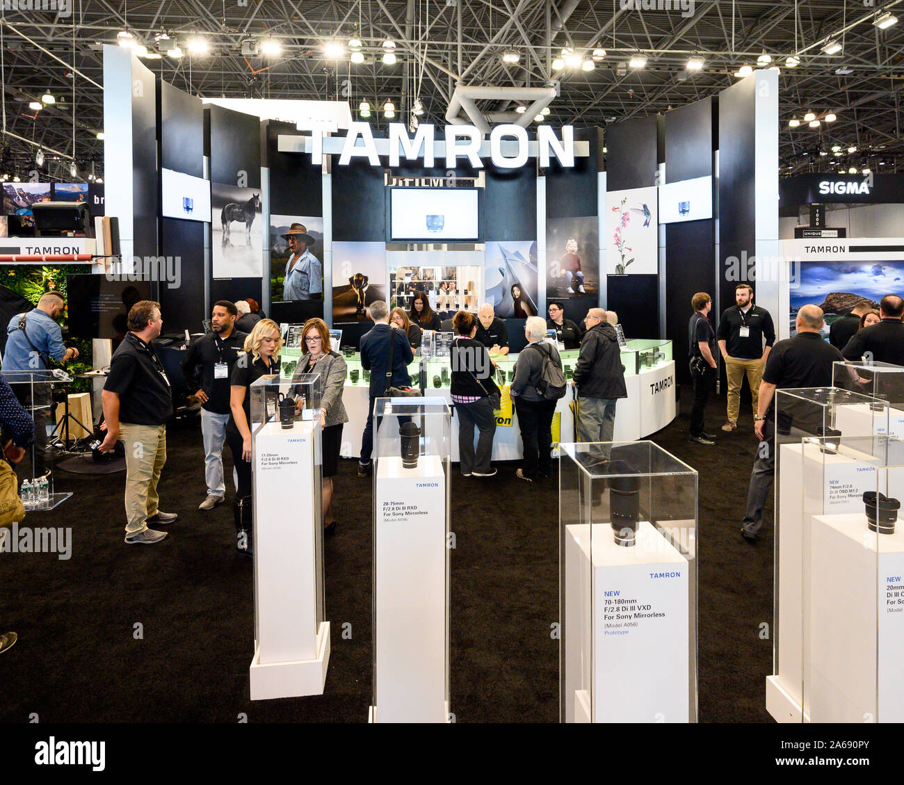 The Tamron booth seen during the PhotoPlus Expo conference held at the  Jacob K. Javits Convention Center in New York Stock Photo - Alamy, image size:1300x1129