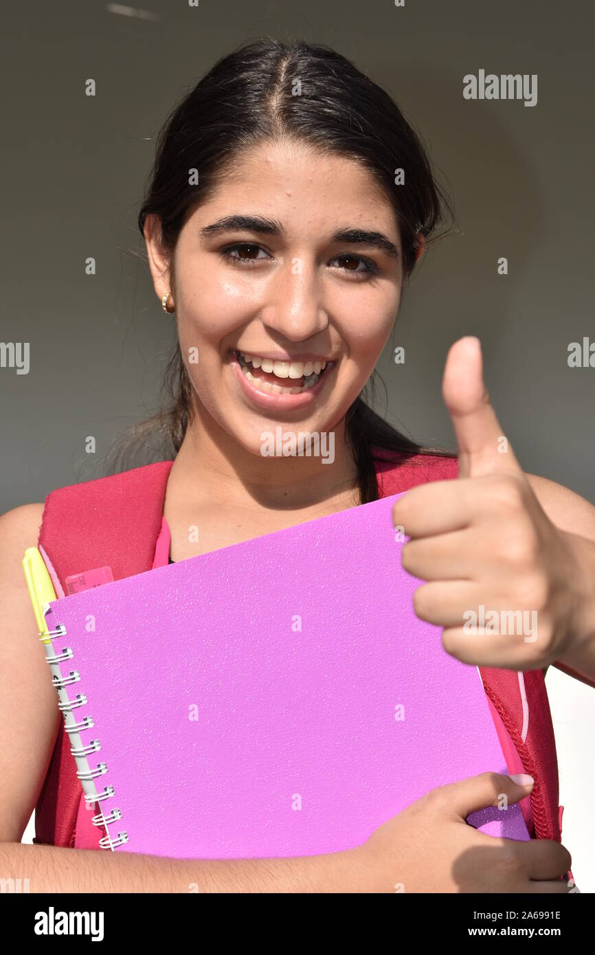 Female Student With Thumbs Up Stock Photo - Alamy